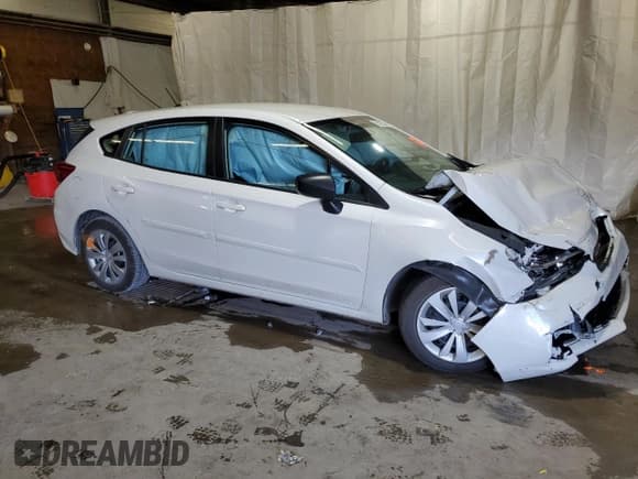 ✅ 2022 Subaru Impreza • VIN: 4S3GTAB66N3713570 • Lot: 60326524. Listed on Copart with Not provided. Free auction sales archive from the USA and detailed vehicle history report at DreamBid. Image 4.