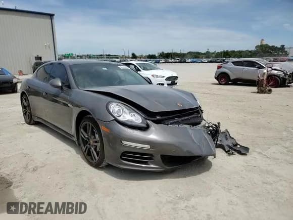 ✅ 2016 Porsche Panamera 4S • VIN: WP0AB2A75GL050164 • Lot: 48320563. Listed on Copart with 31,334 mi. Free auction sales archive from the USA and detailed vehicle history report at DreamBid. Image 12.