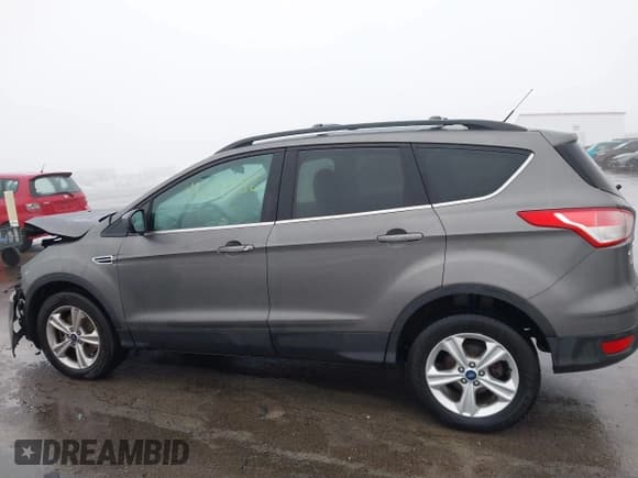 ✅ 2013 Ford Escape SE • VIN: 1FMCU9G94DUD86183 • Lot: 41209082. Listed on IAAI with 187,273 mi. Free auction sales archive from the USA and detailed vehicle history report at DreamBid. Image 14.