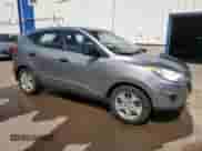 2013 Hyundai Tucson GL with VIN KM8JT3ACXDU556283, listed as a Copart auction lot 64970585 with 227,610 mi miles and Salvage title. Bid and sale history available at DreamBid. Image 4.