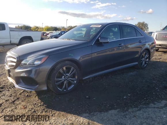 ✅ 2015 Mercedes-Benz E 350 Sport • VIN: WDDHF5KB8FB140653 • Lot: 82433945. Listed on Copart with 52,217 mi. Free auction sales archive from the USA and detailed vehicle history report at DreamBid. Image 1.