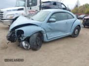 ✅ 2013 Volkswagen Beetle 2.5L • VIN: 3VWJP7AT4DM656381 • Lot: 43627786. Listed on IAAI with 141,093 mi. Free auction sales archive from the USA and detailed vehicle history report at DreamBid. Image 2.