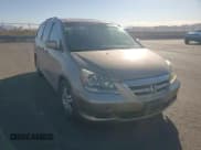 ✅ 2005 Honda Odyssey EX-L • VIN: 5FNRL38705B097212 • Лот: 92655085. Опубликован ранее на Copart с пробегом 162 776 миль. Бесплатный доступ к архиву аукционных продаж из США и подробный отчёт об истории автомобиля на DreamBid. Изображение 14.