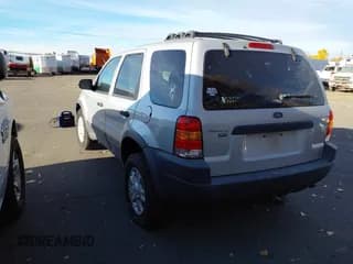 ✅ 2002 Ford Escape XLT Choice • VIN: 1FMCU04132KC37783 • Lot: 43611771. Listed on IAAI with 185,662 mi. Free auction sales archive from the USA and detailed vehicle history report at DreamBid. Image 3.