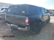 ✅ 2015 Toyota Tacoma • VIN: 5TFLU4EN8FX119895 • Lot: 43670596. Listed on IAAI with 185,866 mi. Free auction sales archive from the USA and detailed vehicle history report at DreamBid. Image 4.