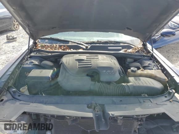 ✅ 2013 Dodge Challenger SXT • VIN: 2C3CDYAG4DH704400 • Lot: 80083314. Wystawiony na Copart z przebiegiem 278 416 mil. Bezpłatny archiwum sprzedaży aukcyjnych z USA i szczegółowy raport historii pojazdu na DreamBid. Zdjęcie 11.