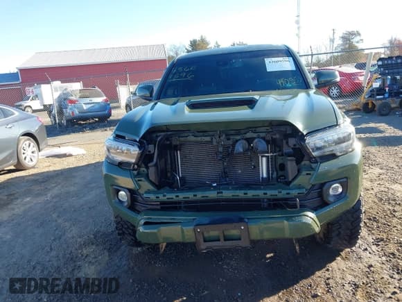 ✅ 2021 Toyota Tacoma SR • VIN: 3TMCZ5AN7MM440553 • Lot: 43609596. Listed on IAAI with 61,689 mi. Free auction sales archive from the USA and detailed vehicle history report at DreamBid. Image 6.