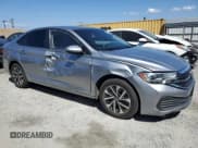 ✅ 2022 Volkswagen Jetta S • VIN: 3VWCM7BU4NM005892 • Lot: 57645845. Listed on Copart with 64,430 mi. Free auction sales archive from the USA and detailed vehicle history report at DreamBid. Image 4.