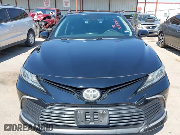 ✅ 2021 Toyota Camry LE • VIN: 4T1C11AKXMU409214 • Lot: 42987667. Listed on IAAI with 83,115 mi. Free auction sales archive from the USA and detailed vehicle history report at DreamBid. Image 12.