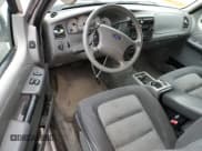 ✅ 2003 Ford Explorer Sport XLS • VIN: 1FMYU60E63UA24544 • Лот: 53888765. Опубликован ранее на Copart с пробегом 263 249 миль. Бесплатный доступ к архиву аукционных продаж из США и подробный отчёт об истории автомобиля на DreamBid. Изображение 8.