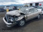 ✅ 1994 Lexus ES 300 • VIN: JT8GK13T8R0055859 • Lot: 40120000. Listed on IAAI with 118,658 mi. Free auction sales archive from the USA and detailed vehicle history report at DreamBid. Image 2.