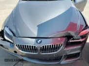 ✅ 2016 BMW 6 Series 650i • VIN: WBA6D4C5XGD977465 • Lot: 56771484. Wystawiony na Copart z przebiegiem 26 115 mil. Bezpłatny archiwum sprzedaży aukcyjnych z USA i szczegółowy raport historii pojazdu na DreamBid. Zdjęcie 12.