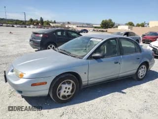 ✅ 2002 Saturn SL • VIN: 1G8ZK52712Z291884 • Лот: 66075874. Опубликован ранее на Copart с пробегом 62 275 миль. Бесплатный доступ к архиву аукционных продаж из США и подробный отчёт об истории автомобиля на DreamBid. Изображение 1.