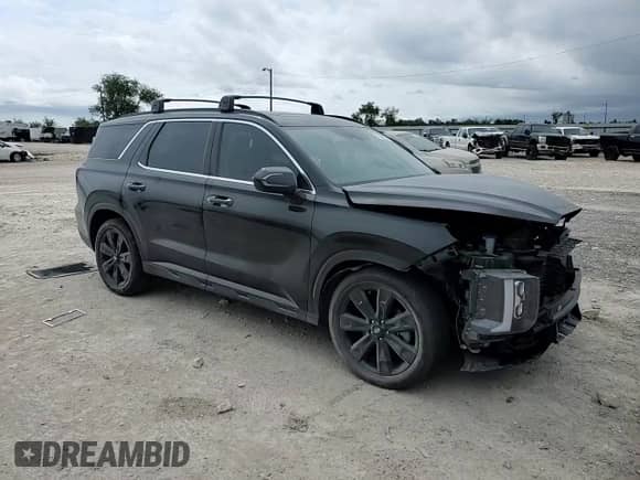 2023 Hyundai Palisade XRT с VIN KM8R3DGE9PU558614, выставлен на аукционе Copart как лот 72505924 с пробегом 12 048 миль миль и Списание • Salvage title. История ставок и продаж доступна на DreamBid. Изображение 12.