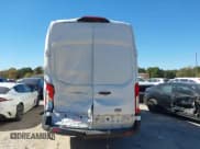 ✅ 2021 Ford Transit Cargo • VIN: 1FTBW3X83MKA14151 • Lot: 43493696. Wystawiony na IAAI z przebiegiem 102 256 mil. Bezpłatny archiwum sprzedaży aukcyjnych z USA i szczegółowy raport historii pojazdu na DreamBid. Zdjęcie 16.