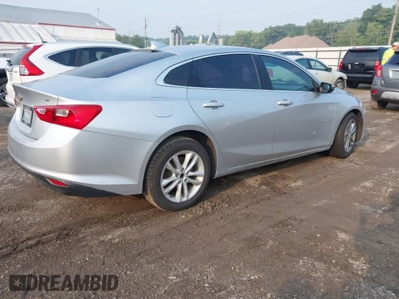 ✅ 2018 Chevrolet Malibu LT • VIN: 1G1ZD5ST2JF230694 • Lot: 42870542. Listed on IAAI with 203,198 mi. Free auction sales archive from the USA and detailed vehicle history report at DreamBid. Image 4.