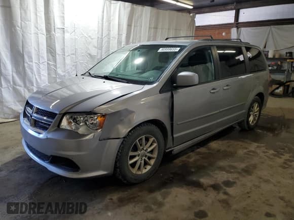✅ 2015 Dodge Grand Caravan SXT • VIN: 2C4RDGCGXFR591384 • Lot: 90999655. Listed on Copart with 214,816 mi. Free auction sales archive from the USA and detailed vehicle history report at DreamBid. Image 1.