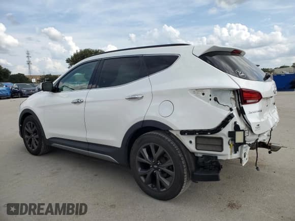 ✅ 2017 Hyundai Santa Fe Ultimate • VIN: 5XYZWDLA4HG435000 • Лот: 71645544. Опубликован ранее на Copart с пробегом 99 328 миль. Бесплатный доступ к архиву аукционных продаж из США и подробный отчёт об истории автомобиля на DreamBid. Изображение 2.