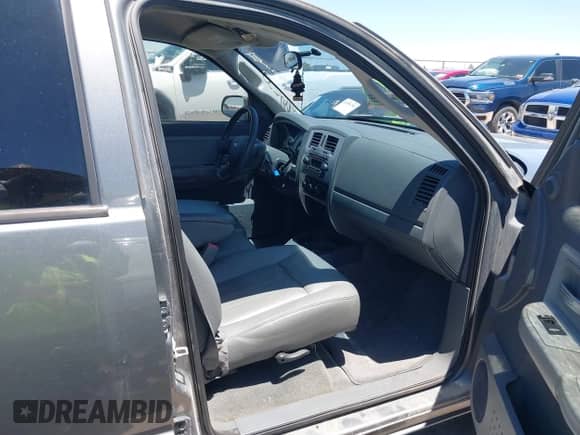 2007 Dodge Dakota Laramie with VIN 1D7HE58N17S160524, listed as a IAAI auction lot 42884532 with 166,814 mi miles and . Bid and sale history available at DreamBid. Image 5.