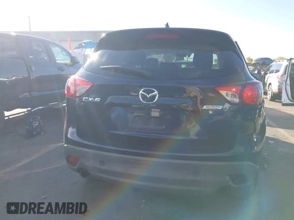 ✅ 2016 Mazda CX-5 Grand Touring • VIN: JM3KE2DY8G0866133 • Лот: 43474326. Опубликован ранее на IAAI с пробегом 164 072 миль. Бесплатный доступ к архиву аукционных продаж из США и подробный отчёт об истории автомобиля на DreamBid. Изображение 16.