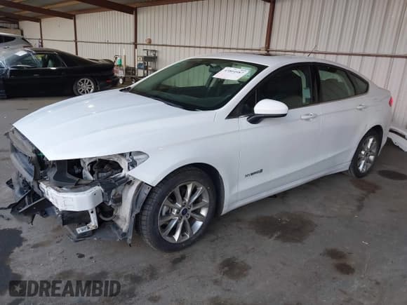 ✅ 2017 Ford Fusion Hybrid SE • VIN: 3FA6P0LU8HR315411 • Lot: 43804987. Listed on IAAI with 124,226 mi. Free auction sales archive from the USA and detailed vehicle history report at DreamBid. Image 2.