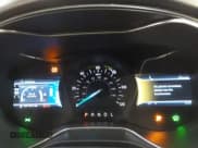 ✅ 2014 Ford Fusion Titanium Hybrid • VIN: 3FA6P0RU6ER175894 • Lot: 43220307. Listed on IAAI with 157,170 mi. Free auction sales archive from the USA and detailed vehicle history report at DreamBid. Image 7.