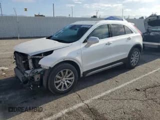 ✅ 2019 Cadillac XT4 AWD Premium Luxury • VIN: 1GYFZDR49KF146470 • Лот: 66012165. Опубликован ранее на Copart с пробегом 101 677 миль. Бесплатный доступ к архиву аукционных продаж из США и подробный отчёт об истории автомобиля на DreamBid. Изображение 1.