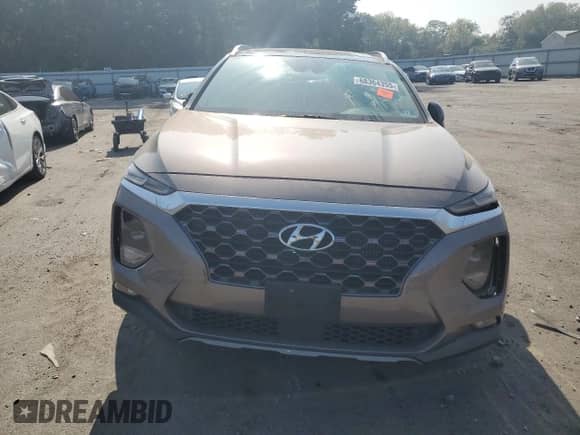 2019 Hyundai Santa Fe Limited z VIN 5NMS5CAA2KH112501, wystawiony jako Copart lot #68364355 z przebiegiem Nie podano mil oraz Szkoda całkowita • Salvage title. Historia ofert i sprzedaży dostępna na DreamBid. Obrazek 5.