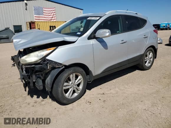 2012 Hyundai Tucson GLS z VIN KM8JUCAC1CU417011, wystawiony jako Copart lot #68081894 z przebiegiem 163 899 mil mil oraz Szkoda całkowita • Salvage title. Historia ofert i sprzedaży dostępna na DreamBid. Obrazek 1.