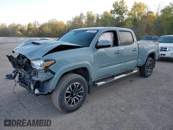 ✅ 2022 Toyota Tacoma TRD Off Road • VIN: 3TYDZ5BN8NT007185 • Лот: 85504595. Опубликован ранее на Copart с пробегом 70 950 миль. Бесплатный доступ к архиву аукционных продаж из США и подробный отчёт об истории автомобиля на DreamBid. Изображение 1.