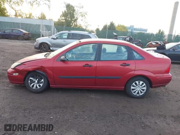 ✅ 2003 Ford Focus LX • VIN: 1FAFP33P33W245107 • Lot: 43434445. Listed on IAAI with 135,370 mi. Free auction sales archive from the USA and detailed vehicle history report at DreamBid. Image 14.