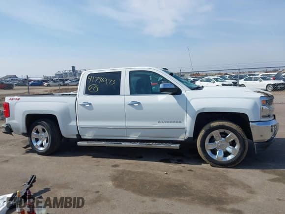 ✅ 2018 Chevrolet Silverado 1500 LTZ • VIN: 3GCUKSEC9JG530572 • Lot: 41796973. Wystawiony na IAAI z przebiegiem 117 842 mil. Bezpłatny archiwum sprzedaży aukcyjnych z USA i szczegółowy raport historii pojazdu na DreamBid. Zdjęcie 13.