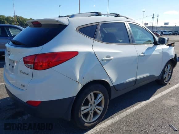 2012 Hyundai Tucson Limited с VIN KM8JUCAC1CU336154, выставлен на аукционе IAAI как лот 43344870 с пробегом 197 821 миль миль и . История ставок и продаж доступна на DreamBid. Изображение 4.