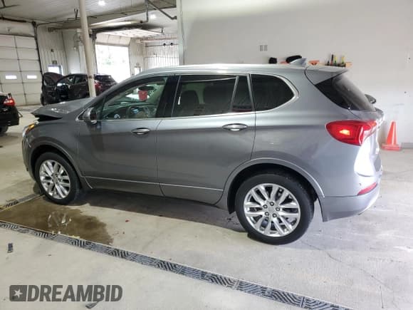 ✅ 2020 Buick Envision Premium • VIN: LRBFX3SX0LD137999 • Лот: 70746225. Опубликован ранее на Copart с пробегом 56 953 миль. Бесплатный доступ к архиву аукционных продаж из США и подробный отчёт об истории автомобиля на DreamBid. Изображение 2.
