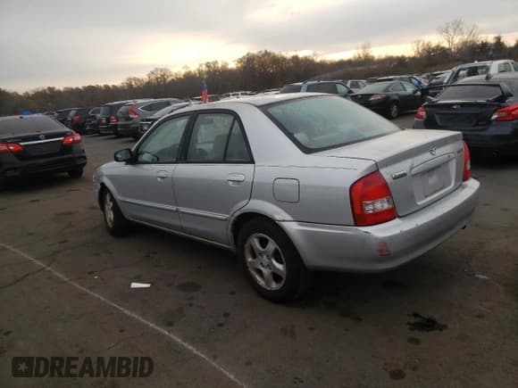✅ 1999 Mazda Protege ES • VIN: JM1BJ2218X0153260 • Lot: 78893394. Wystawiony na Copart z przebiegiem 196 034 mil. Bezpłatny archiwum sprzedaży aukcyjnych z USA i szczegółowy raport historii pojazdu na DreamBid. Zdjęcie 2.