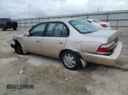 ✅ 1997 Toyota Corolla DX • VIN: 1NXBB02E7VZ607195 • Лот: 73419084. Опубликован ранее на Copart с пробегом 119 448 миль. Бесплатный доступ к архиву аукционных продаж из США и подробный отчёт об истории автомобиля на DreamBid. Изображение 2.