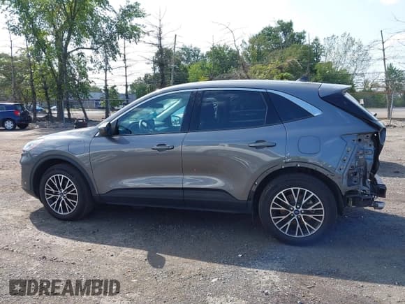 ✅ 2022 Ford Escape SEL Plug-In Hybrid • VIN: 1FMCU0KZ2NUB08550 • Lot: 43167600. Listed on IAAI with 23,719 mi. Free auction sales archive from the USA and detailed vehicle history report at DreamBid. Image 14.