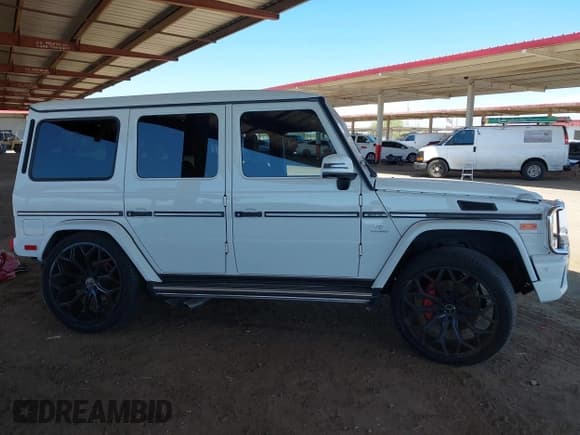 ✅ 2015 Mercedes-Benz G 63 AMG • VIN: WDCYC7DF5FX234579 • Lot: 42057392. Listed on IAAI with 124,585 mi. Free auction sales archive from the USA and detailed vehicle history report at DreamBid. Image 13.