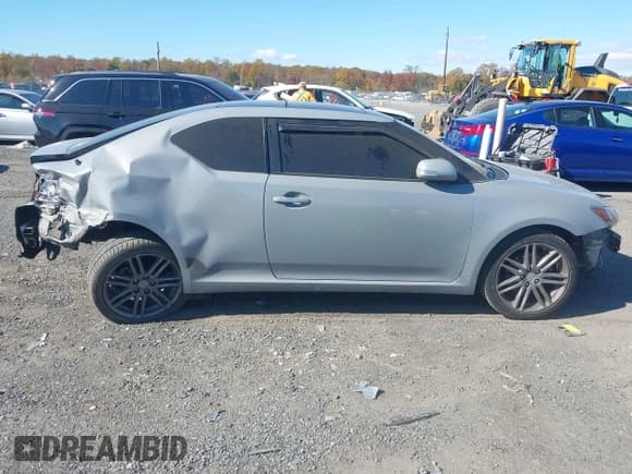 ✅ 2013 Scion tC • VIN: JTKJF5C79D3062499 • Lot: 43523715. Wystawiony na IAAI z przebiegiem 144 340 mil. Bezpłatny archiwum sprzedaży aukcyjnych z USA i szczegółowy raport historii pojazdu na DreamBid. Zdjęcie 13.