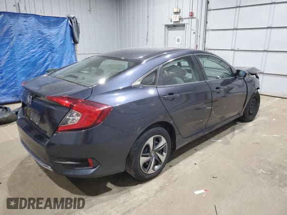 ✅ 2019 Honda Civic LX • VIN: 2HGFC2F63KH592860 • Lot: 80838185. Listed on Copart with 81,631 mi. Free auction sales archive from the USA and detailed vehicle history report at DreamBid. Image 3.