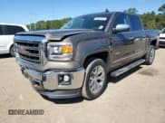 ✅ 2015 GMC Sierra 1500 SLT • VIN: 3GTP1VEC2FG142477 • Лот: 85950145. Опубликован ранее на Copart с пробегом 116 218 миль. Бесплатный доступ к архиву аукционных продаж из США и подробный отчёт об истории автомобиля на DreamBid. Изображение 1.