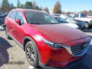 ✅ 2021 Mazda CX-9 Touring • VIN: JM3TCACY3M0503885 • Lot: 43456010. Wystawiony na IAAI z przebiegiem 56 510 mil. Bezpłatny archiwum sprzedaży aukcyjnych z USA i szczegółowy raport historii pojazdu na DreamBid. Zdjęcie 1.