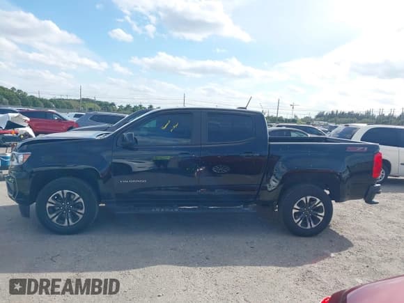 ✅ 2021 Chevrolet Colorado 2WD Z71 • VIN: 1GCGSDEN3M1132058 • Лот: 41649837. Опубликован ранее на IAAI с пробегом 74 057 миль. Бесплатный доступ к архиву аукционных продаж из США и подробный отчёт об истории автомобиля на DreamBid. Изображение 14.