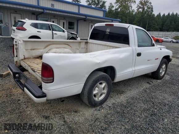 1997 Dodge Dakota с VIN 1B7FL26P8VS185234, выставлен на аукционе Copart как лот 71407854 с пробегом 220 549 миль миль и Списание • Salvage title. История ставок и продаж доступна на DreamBid. Изображение 3.