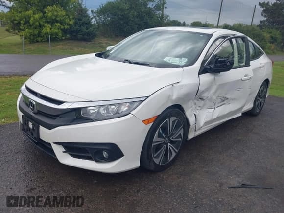 ✅ 2018 Honda Civic EX-T • VIN: JHMFC1F3XJX002306 • Lot: 43149201. Listed on IAAI with 77,470 mi. Free auction sales archive from the USA and detailed vehicle history report at DreamBid. Image 2.