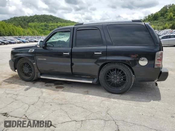 ✅ 2002 Cadillac Escalade • VIN: 1GYEK63NX2R214559 • Lot: 65007924. Wystawiony na Copart z przebiegiem 242 738 mil. Bezpłatny archiwum sprzedaży aukcyjnych z USA i szczegółowy raport historii pojazdu na DreamBid. Zdjęcie 2.