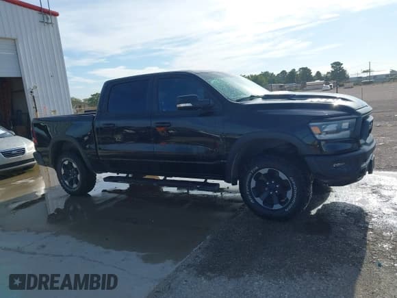 ✅ 2019 Ram 1500 Rebel • VIN: 1C6SRFLTXKN812507 • Lot: 42592453. Listed on IAAI with 128,714 mi. Free auction sales archive from the USA and detailed vehicle history report at DreamBid. Image 13.