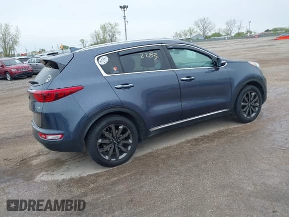 ✅ 2018 Kia Sportage EX • VIN: KNDPN3AC0J7477840 • Lot: 42162283. Listed on IAAI with 164,891 mi. Free auction sales archive from the USA and detailed vehicle history report at DreamBid. Image 4.