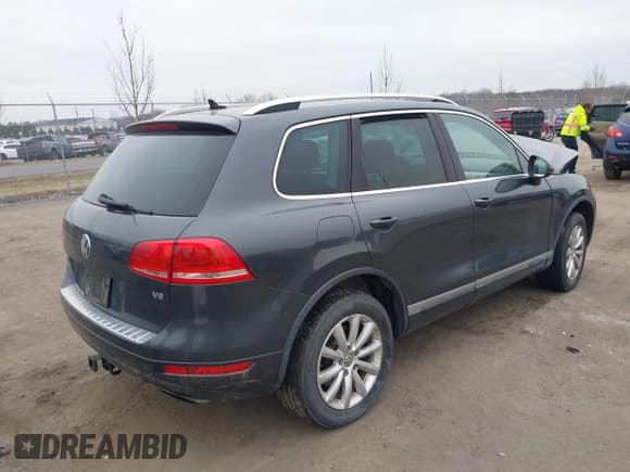 ✅ 2012 Volkswagen Touareg Sport • VIN: WVGEF9BP5CD011717 • Lot: 41787614. Wystawiony na IAAI z przebiegiem 138 127 mil. Bezpłatny archiwum sprzedaży aukcyjnych z USA i szczegółowy raport historii pojazdu na DreamBid. Zdjęcie 4.