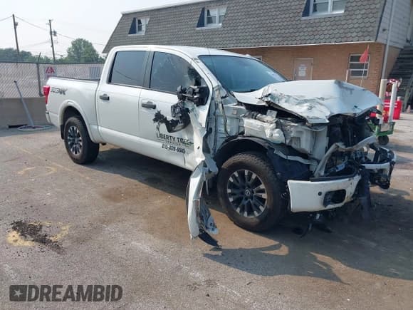 ✅ 2017 Nissan Titan SV • VIN: 1N6AA1E59HN541474 • Lot: 42884307. Listed on IAAI with 100,422 mi. Free auction sales archive from the USA and detailed vehicle history report at DreamBid. Image 1.